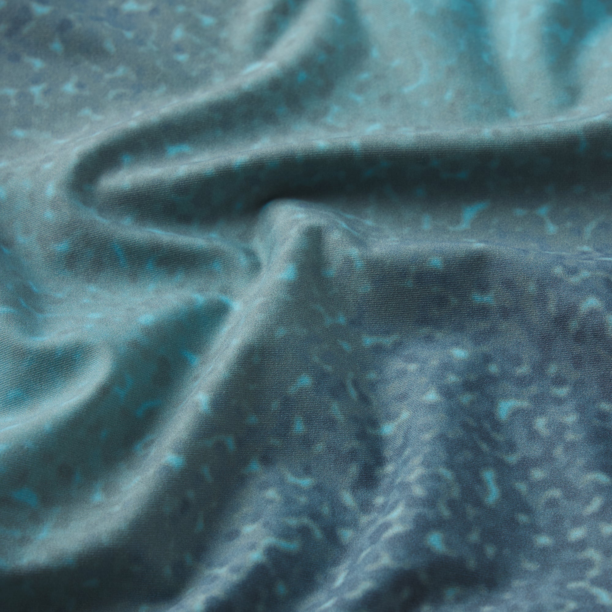 SIGNATURE SWIM PLUNGE MONOKINI | CYAN FK OMBRE PRINT ON A MODEL FRONT VIEW 