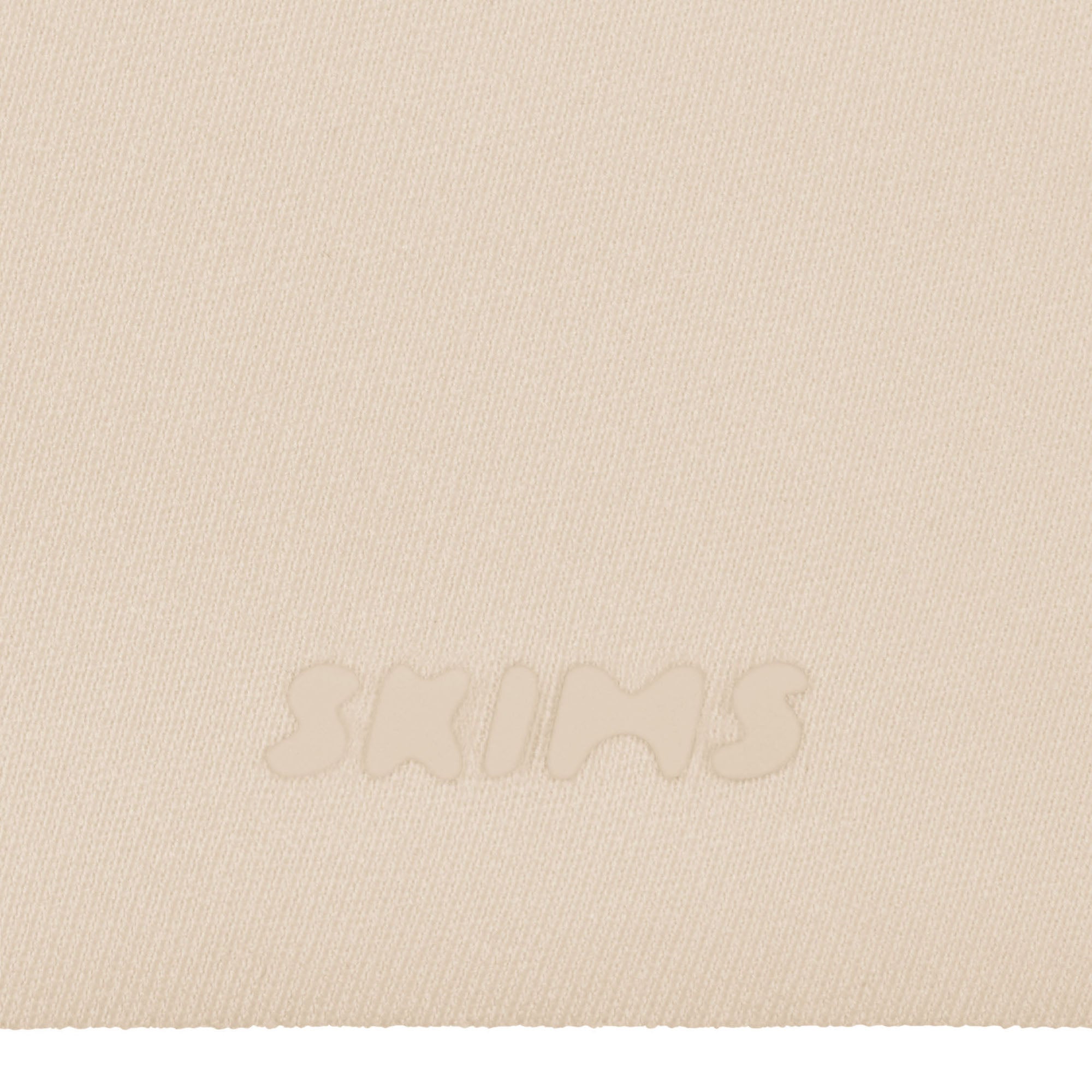 SKIMS ULTIMATE BODY PUSH-UP THONG BODYSUIT | SAND ADDITIONAL FABRIC DETAILS