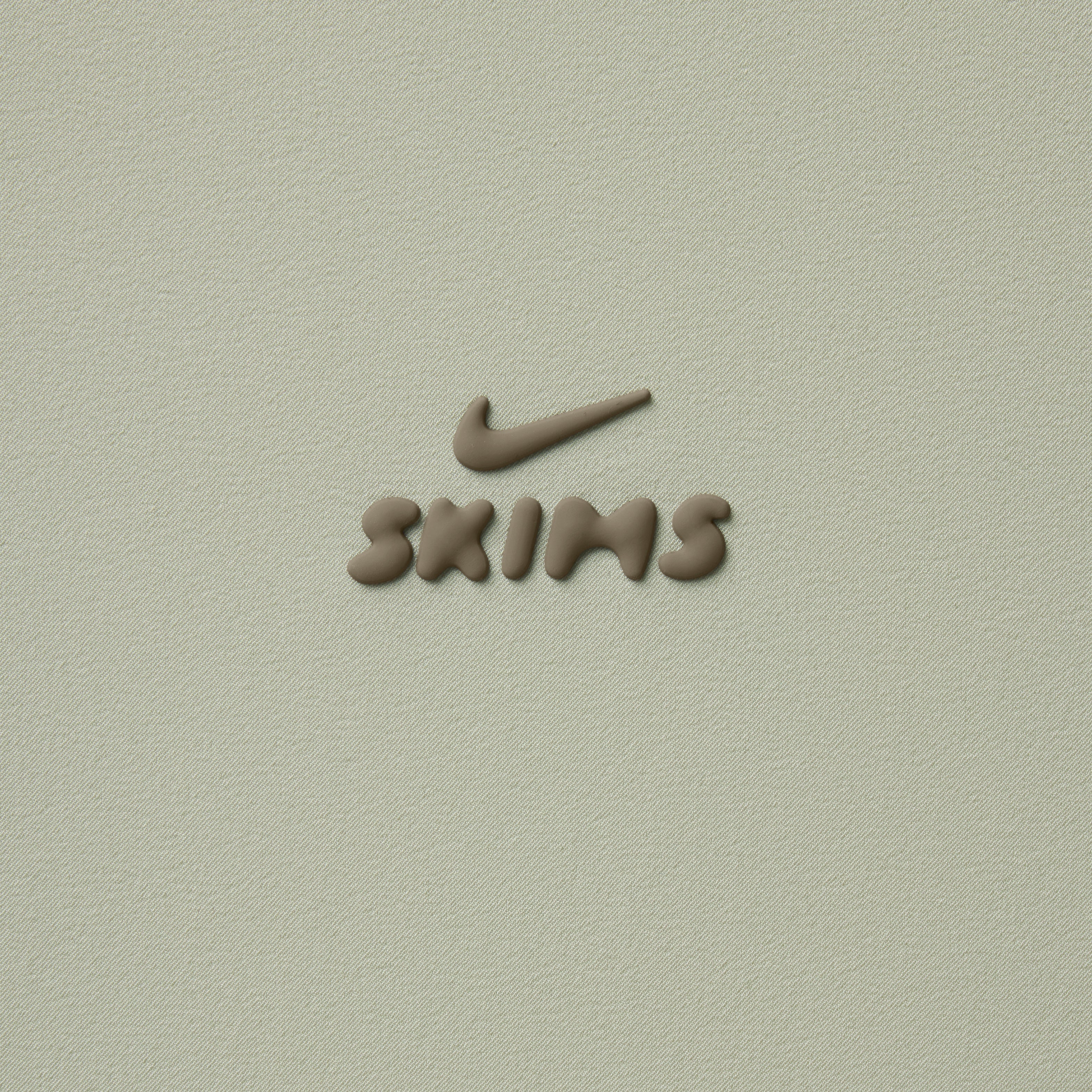 NikeSKIMS STRETCH NYLON OVERSIZED VEST | TALC & LAYS FLAT ON A WHITE BACKGROUND | FLT