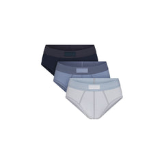 SKIMS COTTON MENS BRIEF 3-PACK | NIMBUS MULTI FLAT ON A WHITE BACKGROUND | FLT @ | FOCUS: 0.0, 1.0, 0.9
