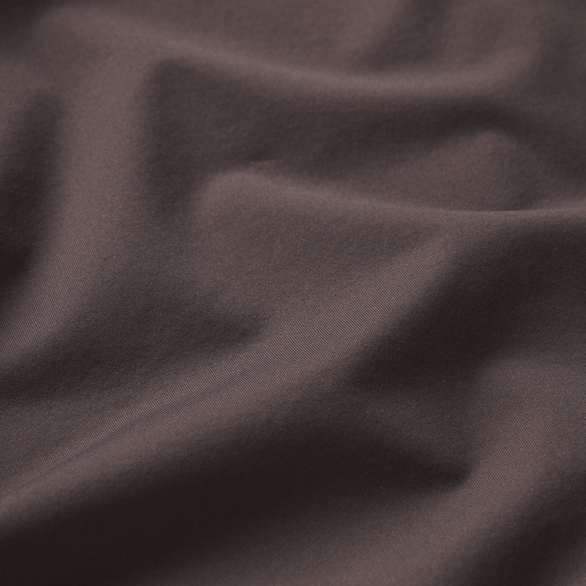 NikeSKIMS WEIGHTLESS LAYERS MOCK NECK LONG SLEEVE TOP | BOULDER & LAYS FLAT ON A WHITE BACKGROUND | FLT