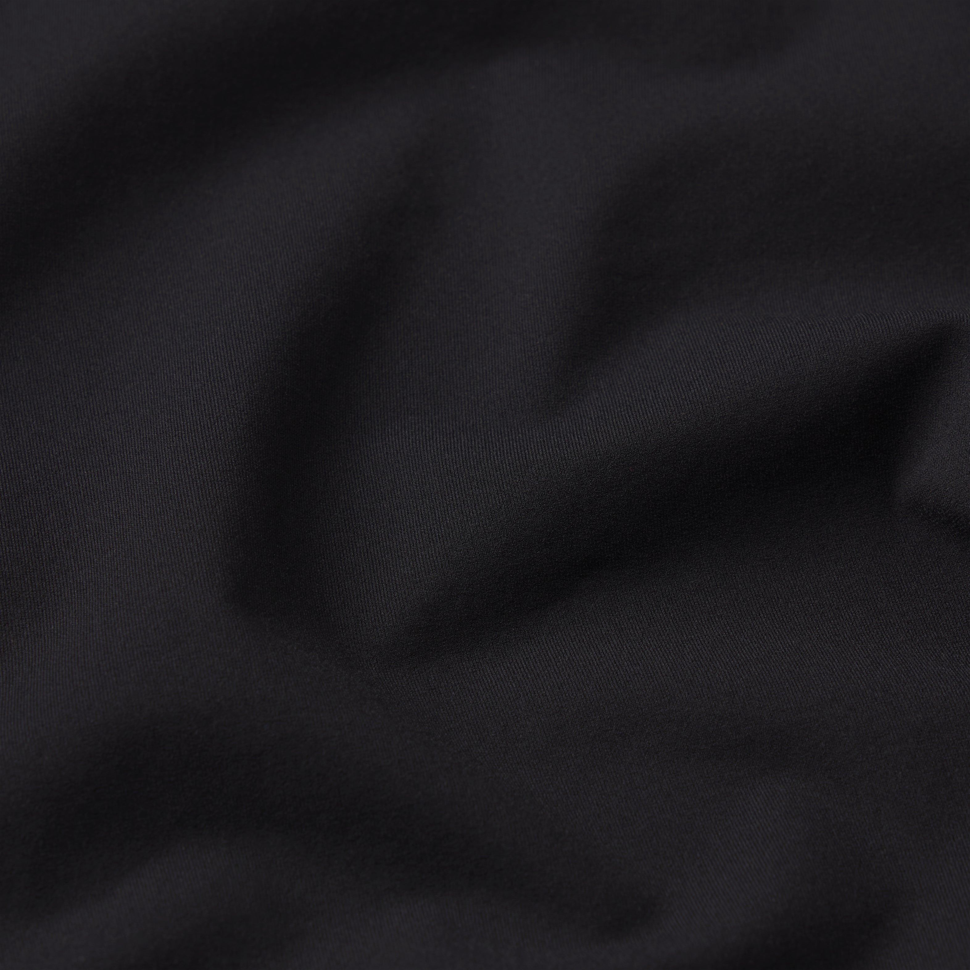 NikeSKIMS WEIGHTLESS LAYERS MOCK NECK SHORT SLEEVE T-SHIRT | OBSIDIAN & LAYS FLAT ON A WHITE BACKGROUND | FLT
