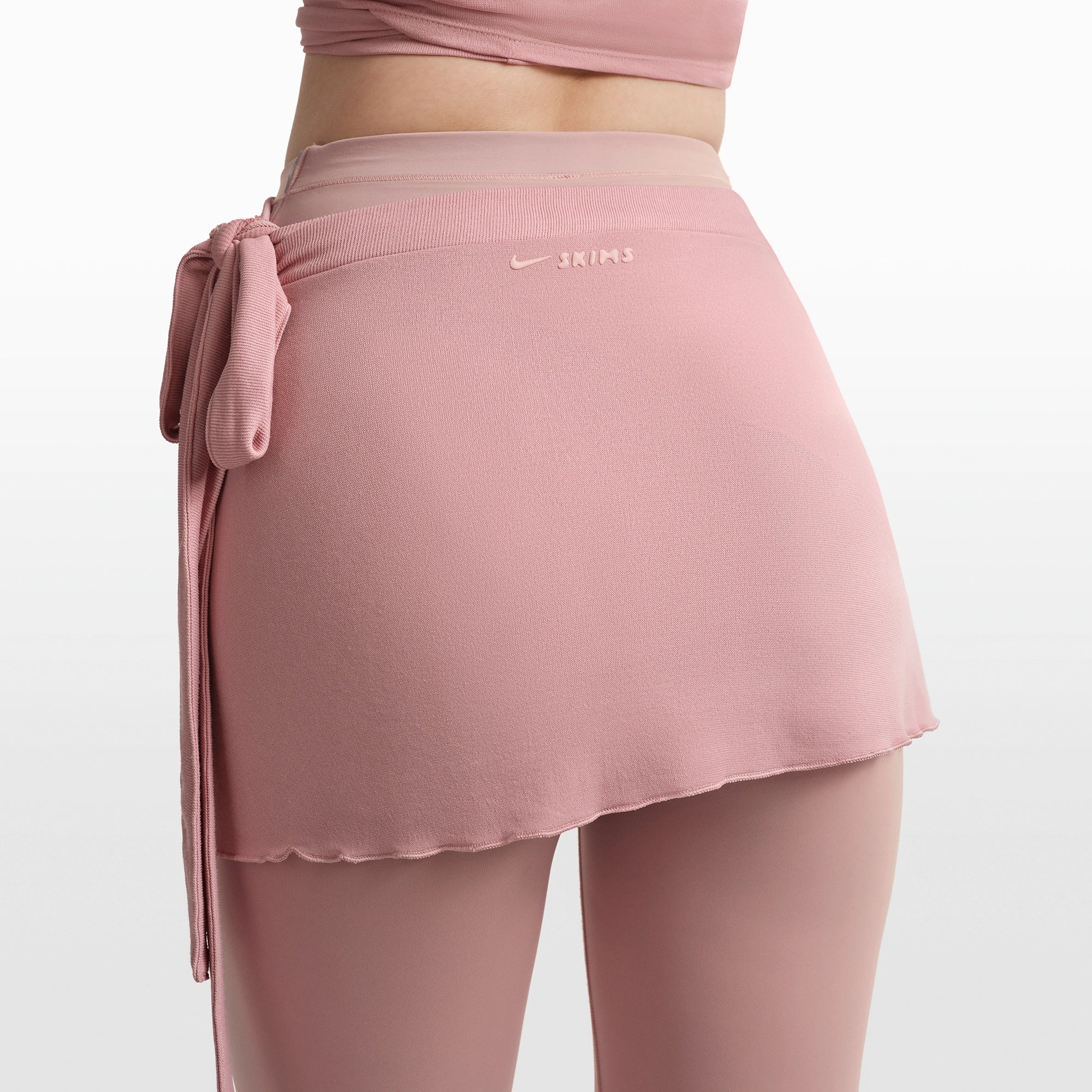 NikeSKIMS STRETCH KNIT WRAP SKIRT | HIMALAYAN ON A MODEL FRONT VIEW @ | FOCUS: 0.0, 1.0, 0.9