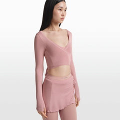 NikeSKIMS STRETCH KNIT WRAP SKIRT | HIMALAYAN ON A MODEL FRONT VIEW @ | FOCUS: 0.0, 1.0, 0.9