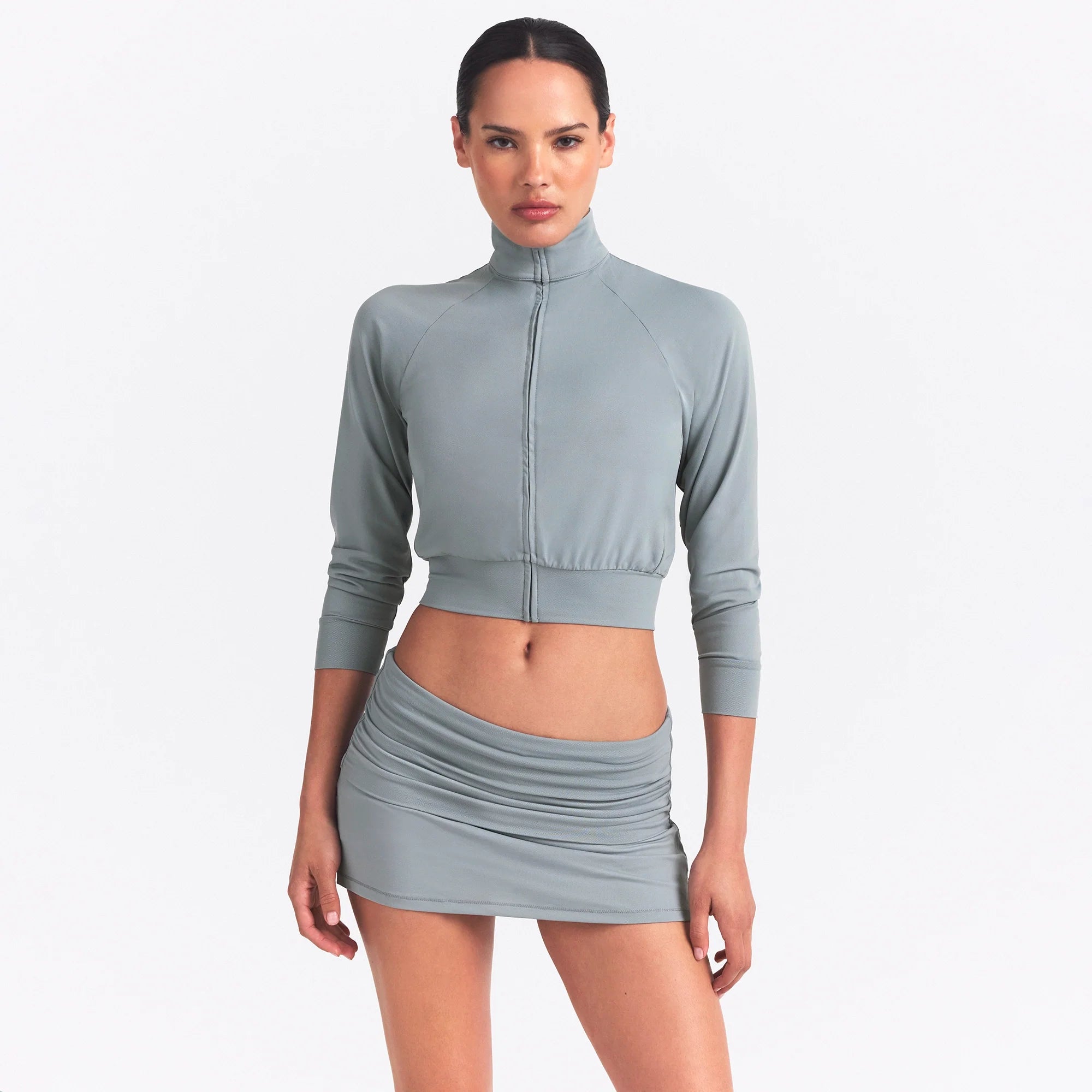 NikeSKIMS AIRY FOLDOVER SKORT | WASHED PACIFIC ON A MODEL FRONT VIEW @ | FOCUS: 0.0, 1.0, 0.9