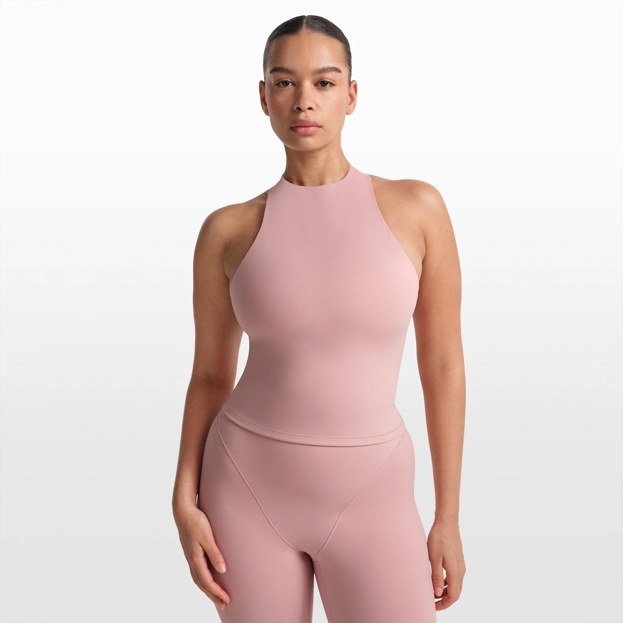 NikeSKIMS MATTE MOCK NECK RACER TANK | HIMALAYAN ON A MODEL FRONT VIEW @ | FOCUS: 0.0, 1.0, 0.9