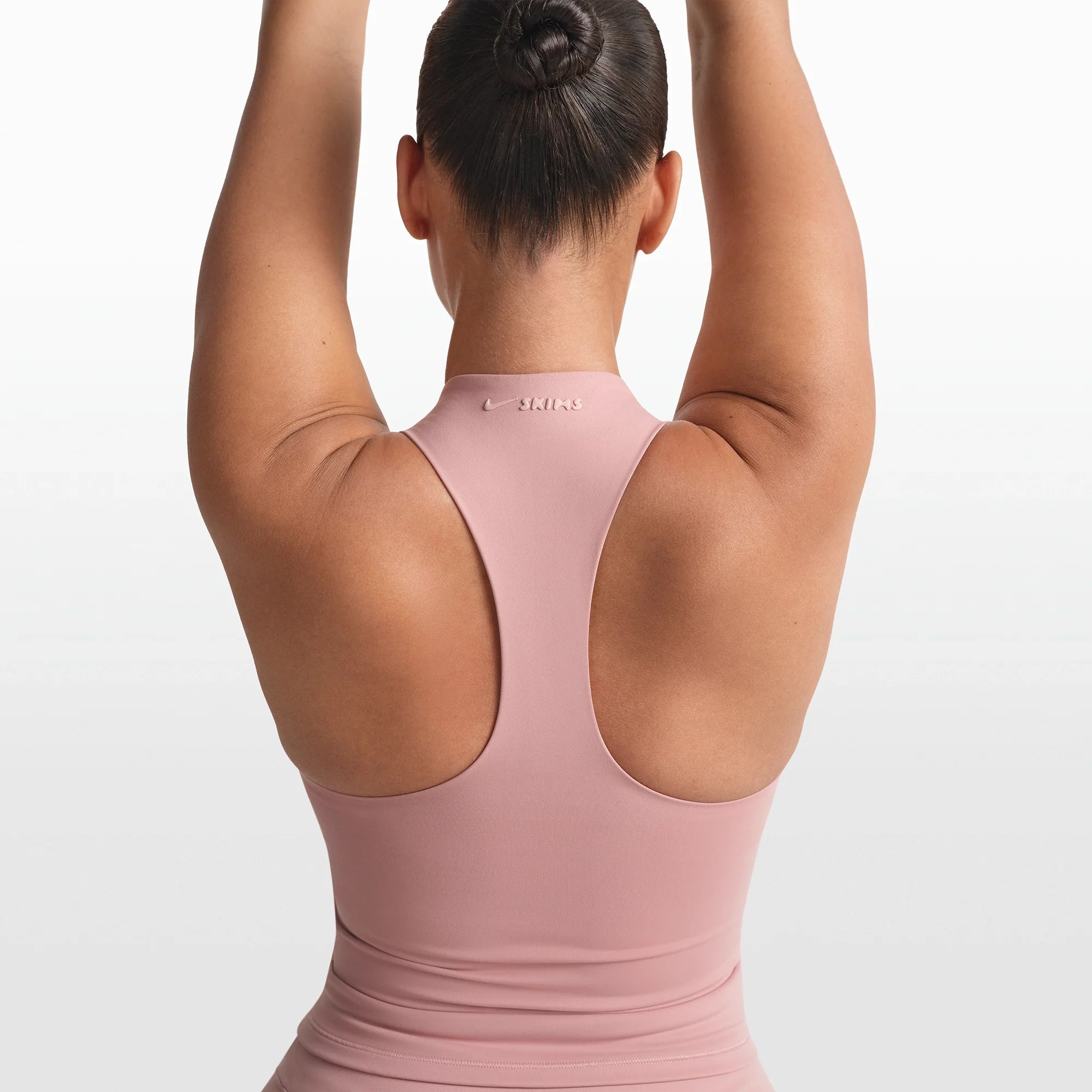 NikeSKIMS MATTE MOCK NECK RACER TANK | HIMALAYAN ON A MODEL FRONT VIEW @ | FOCUS: 0.0, 1.0, 0.9