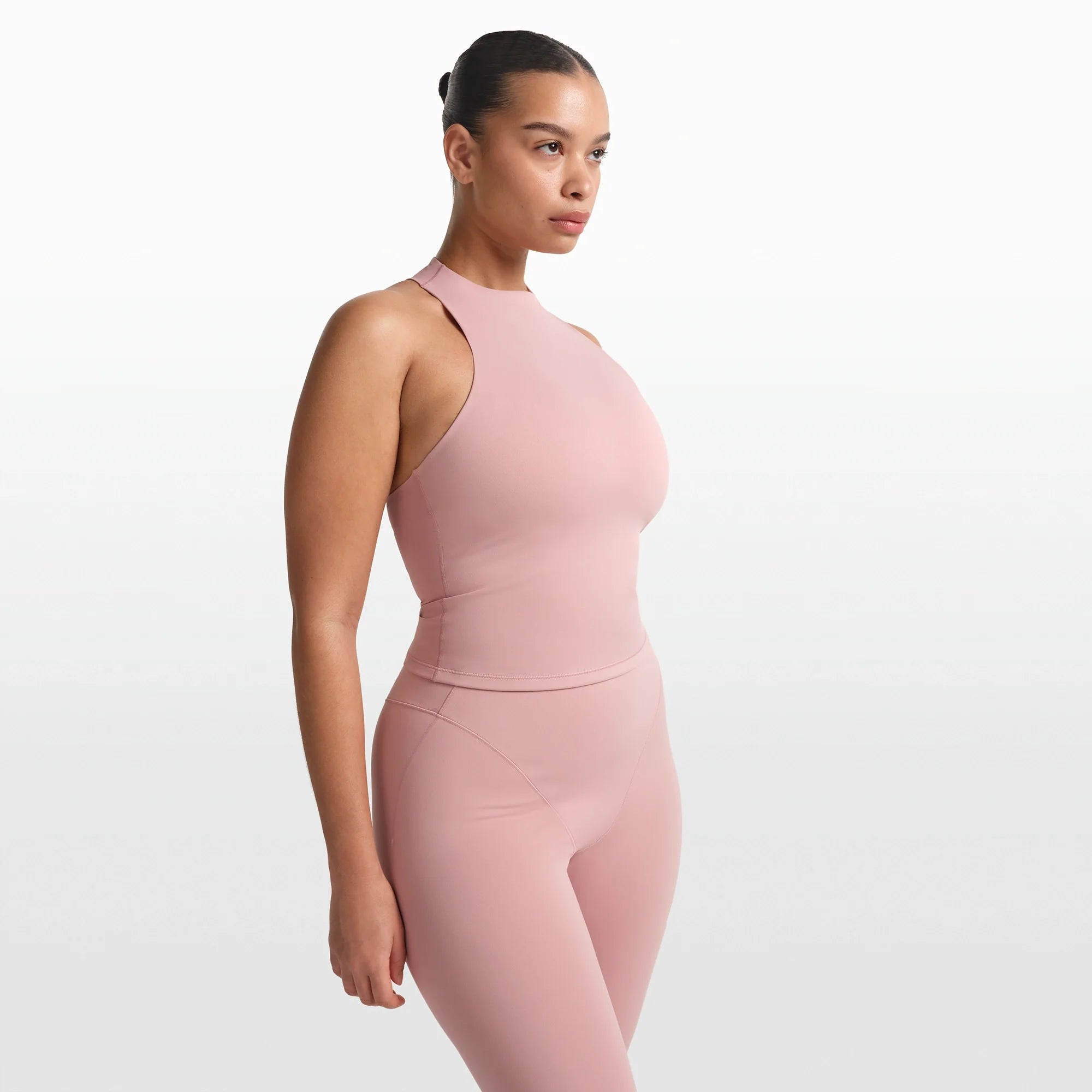 NikeSKIMS MATTE MOCK NECK RACER TANK | HIMALAYAN ON A MODEL FRONT VIEW @ | FOCUS: 0.0, 1.0, 0.9