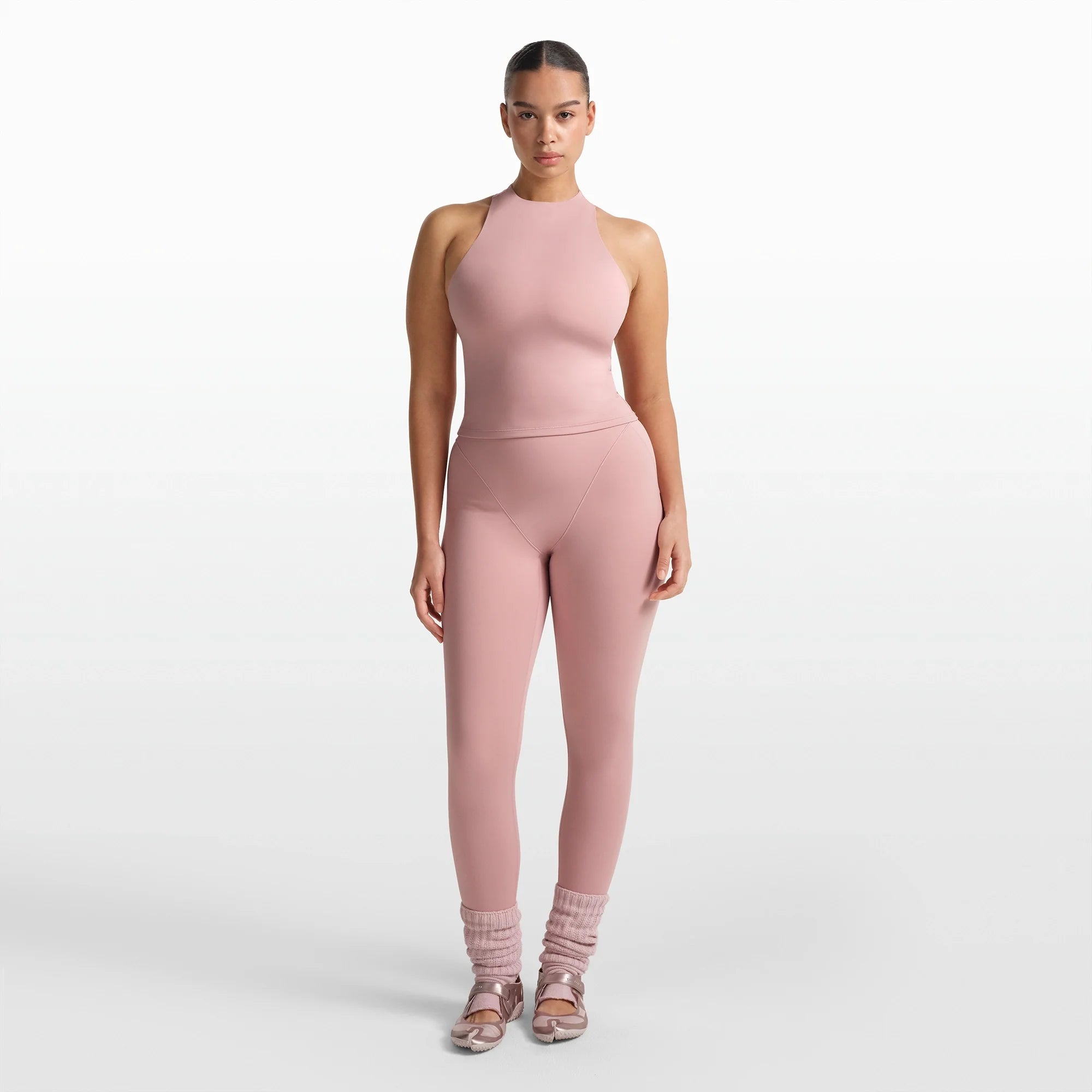 NikeSKIMS MATTE MOCK NECK RACER TANK | HIMALAYAN ON A MODEL FRONT VIEW @ | FOCUS: 0.0, 1.0, 0.9