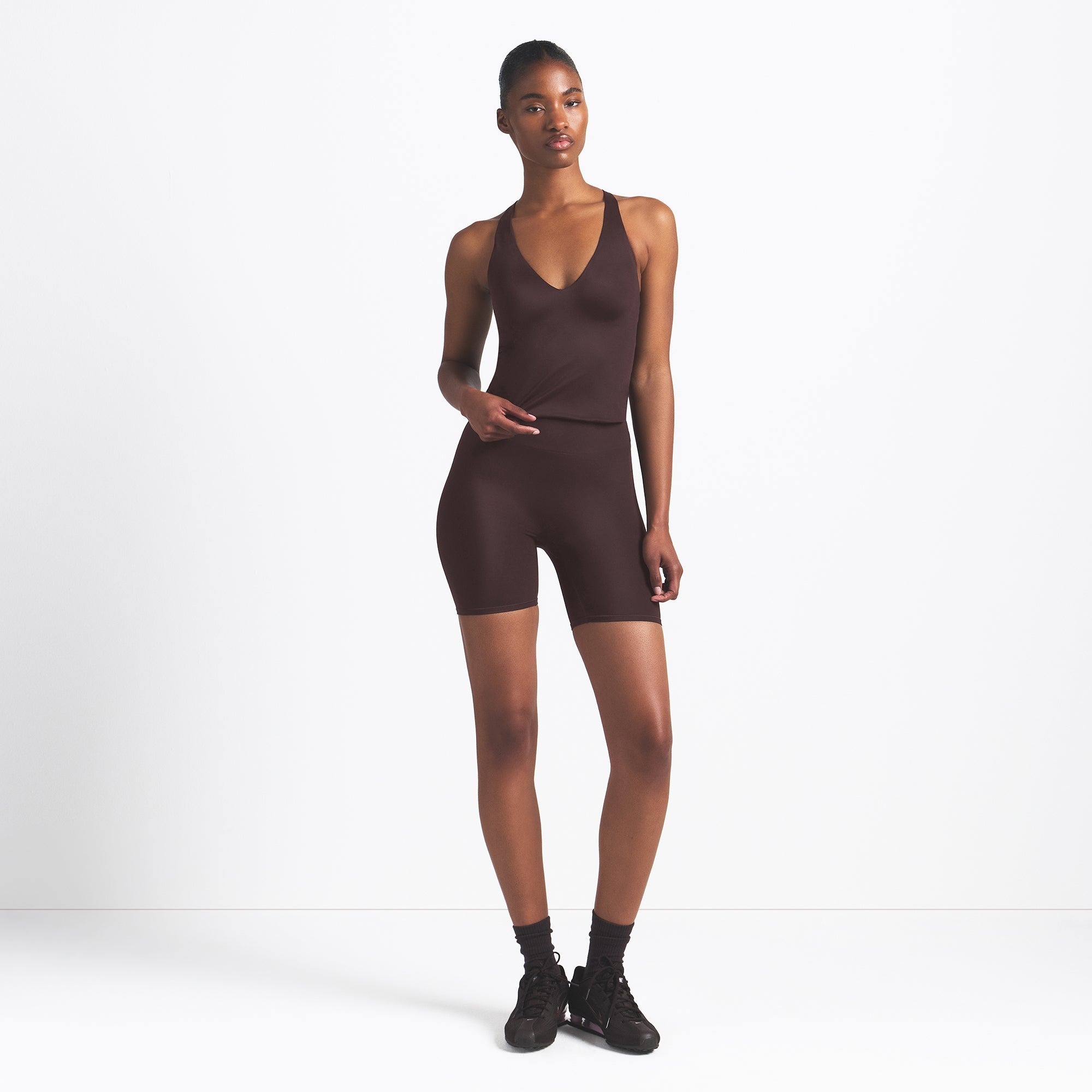 NikeSKIMS SHINE V-NECK TANK | PHOENIX ON A MODEL FRONT VIEW @ | FOCUS: 0.9, 0.1, 0.7