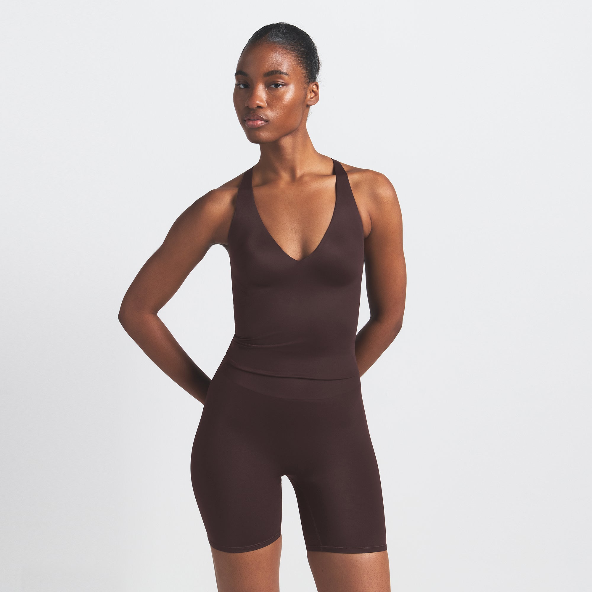 NikeSKIMS SHINE V-NECK TANK | PHOENIX ON A MODEL SIDE VIEW
