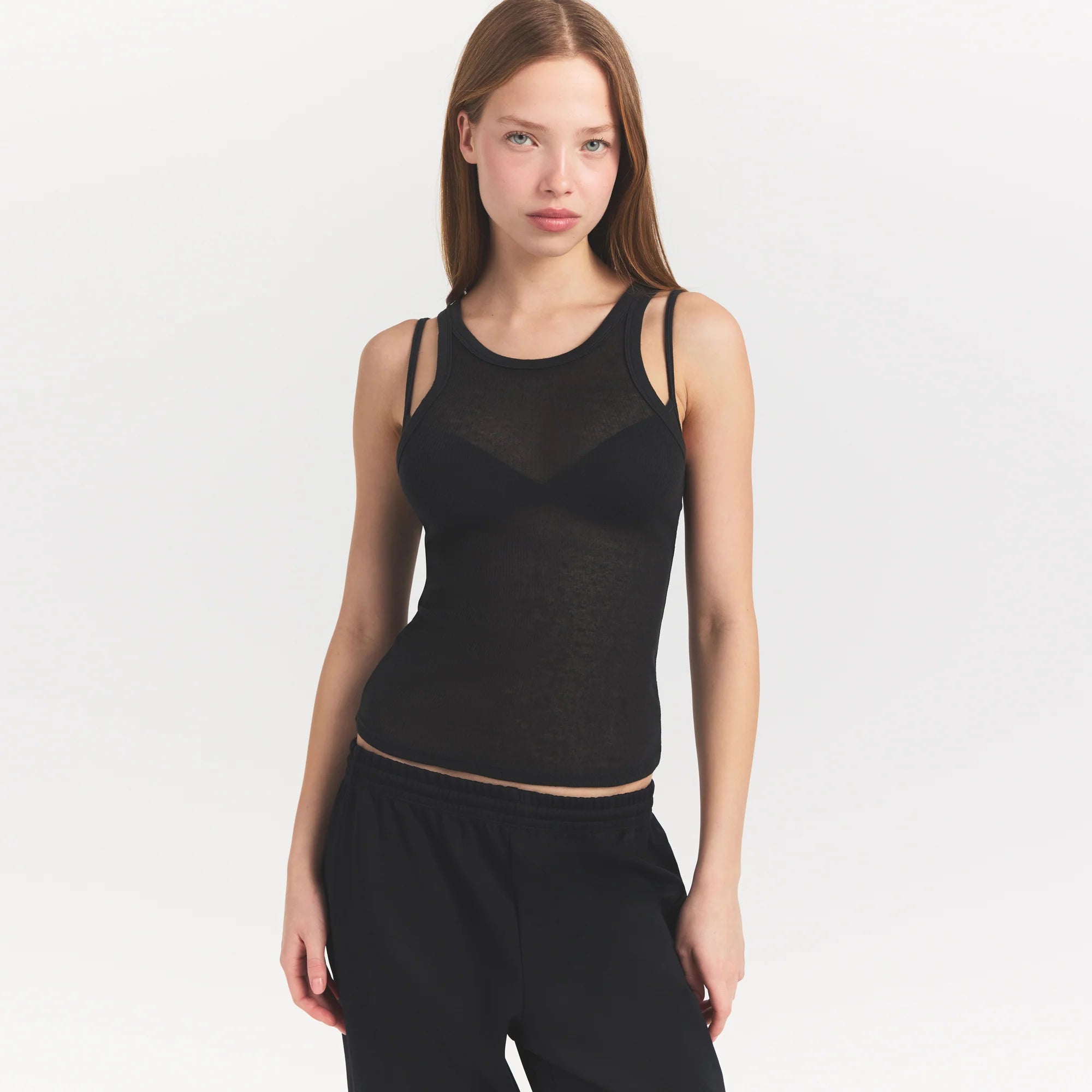 SHEER RIB TANK | SOOT ON A MODEL SIDE VIEW @ | FOCUS: 0.0, 1.0, 0.9