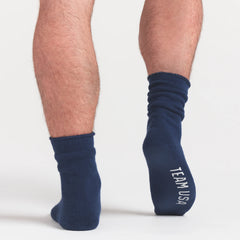 SKIMS FOR TEAM USA MENS OLYMPIC LOUNGE SOCK | NAVYON A MODEL FRONT VIEW @ | FOCUS: 0.0, 1.0, 0.9