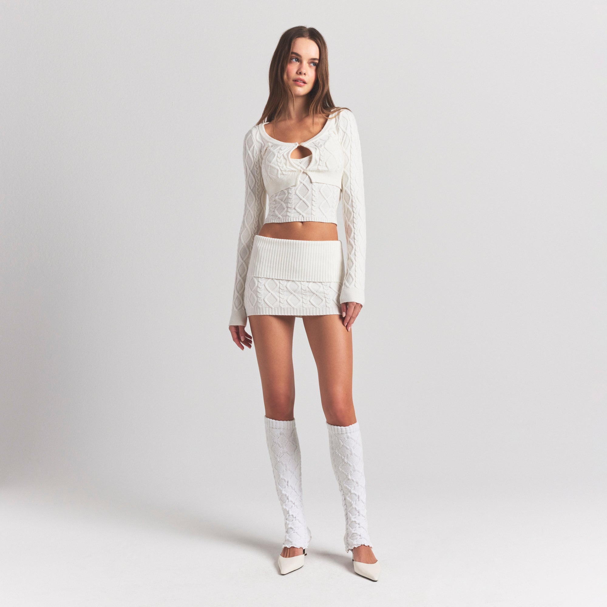 COZY CABLE LEG WARMERS | IVORY ON A MODEL FRONT VIEW @ | FOCUS: 0.0, 1.0, 0.9