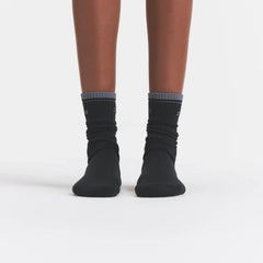 RIBBED CREW LOGO SOCK | ONYX AND DARK HEATHER GREY ON A MODEL | FOCUS: 0.0, 1.0, 0.9