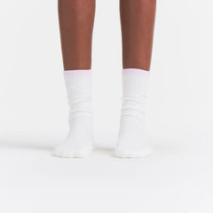 RIBBED CREW LOGO SOCK | SNOW AND CHERRY BLOSSOM ON A MODEL | FOCUS: 0.0, 1.0, 0.9
