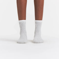 RIBBED QUARTER CREW LOGO SOCK | LIGHT HEATHER GREY AND SNOW ON A MODEL | FOCUS: 0.0, 1.0, 0.9