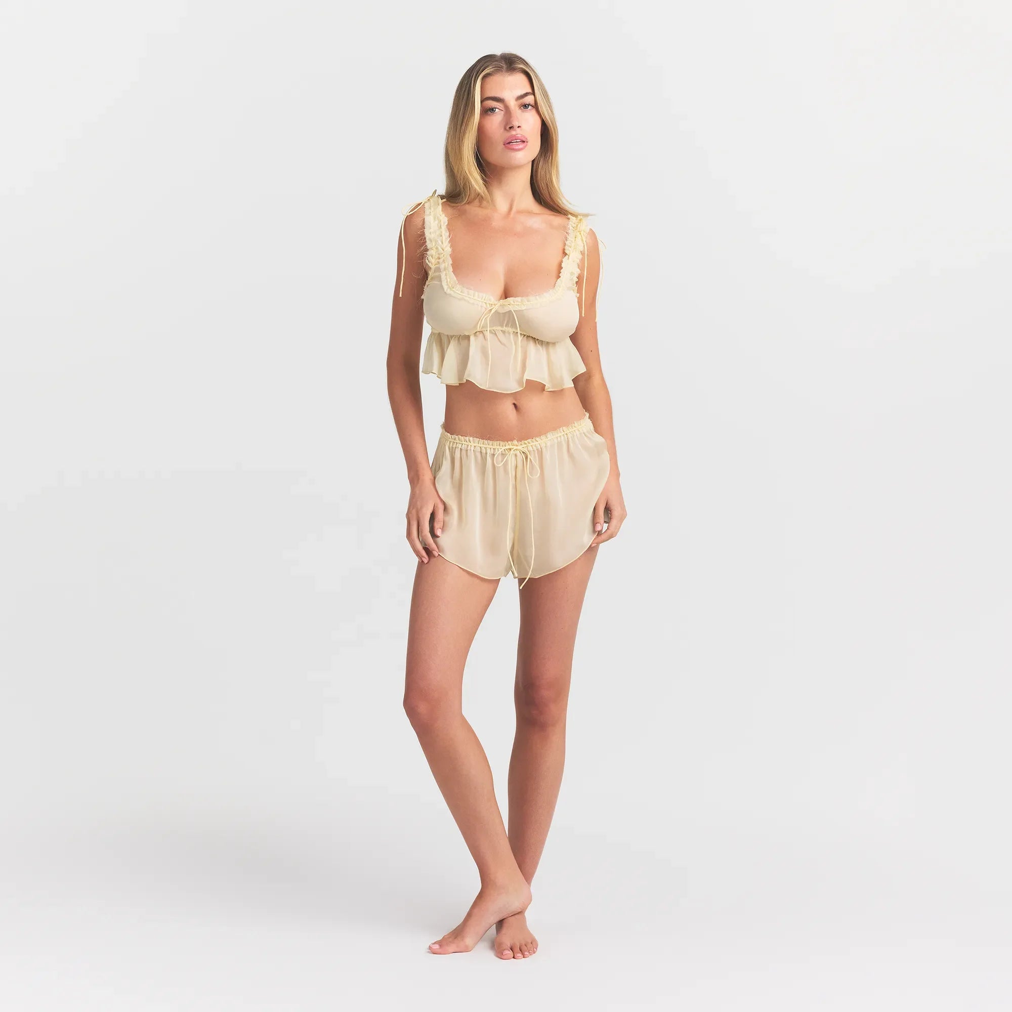 SKIMS ROMANCE BABYDOLL AND SHORT SET | BUTTER ON A MODEL FRONT VIEW @ | FOCUS: 0.0, 1.0, 0.9
