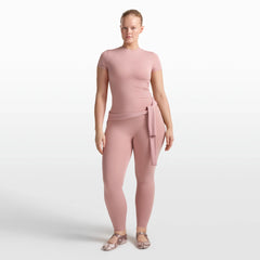 NikeSKIMS MATTE PADDED BABY TEE | HIMALAYAN ON A MODEL FRONT VIEW @ | FOCUS: 0.0, 1.0, 0.9