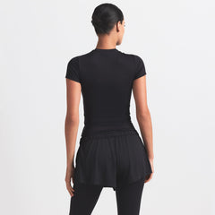 NikeSKIMS MATTE PADDED BABY TEE | OBSIDIAN ON A MODEL BACK VIEW @ | FOCUS: 0.0, 1.0, 0.9