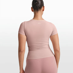 NikeSKIMS RIBBED SEAMLESS BABY TEE | HIMALAYAN/ECRU ON A MODEL FRONT VIEW @ | FOCUS: 0.0, 1.0, 0.9