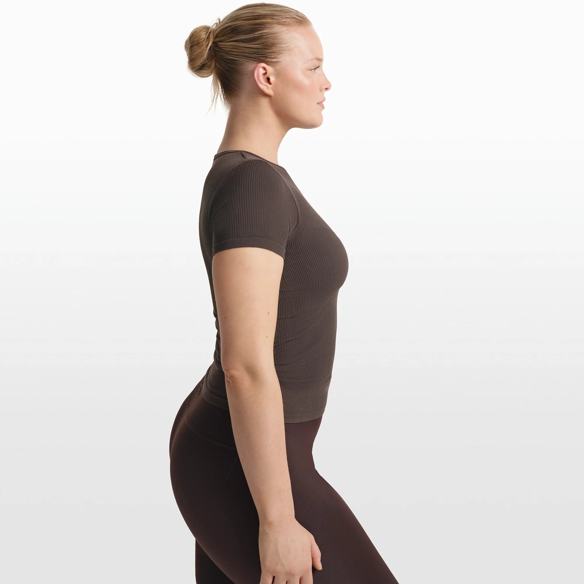 NikeSKIMS RIBBED SEAMLESS BABY TEE | PHOENIX/TRUFFLE ON A MODEL FRONT VIEW @ | FOCUS: 0.0, 1.0, 0.9