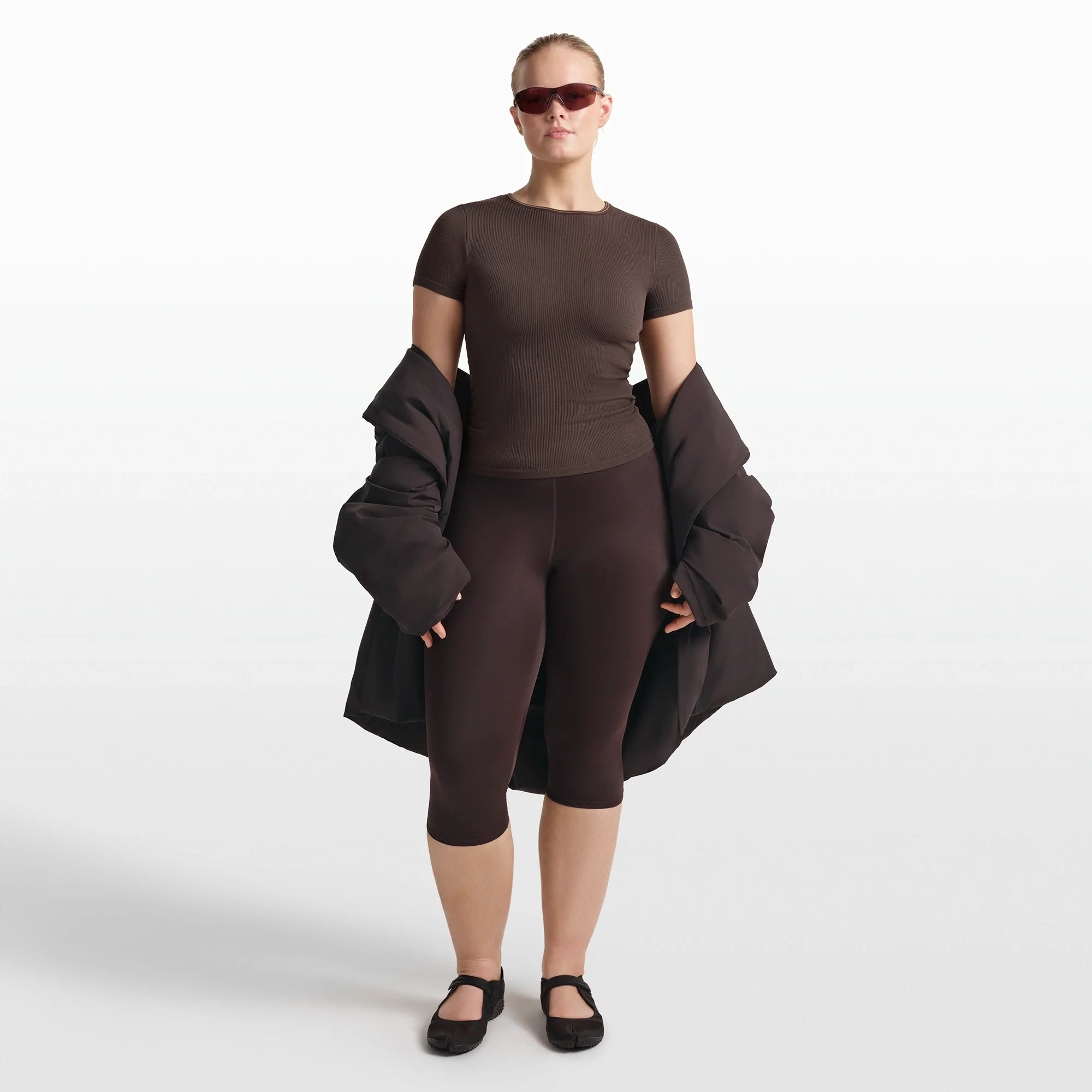 NikeSKIMS RIBBED SEAMLESS BABY TEE | PHOENIX/TRUFFLE ON A MODEL FRONT VIEW @ | FOCUS: 0.0, 1.0, 0.9