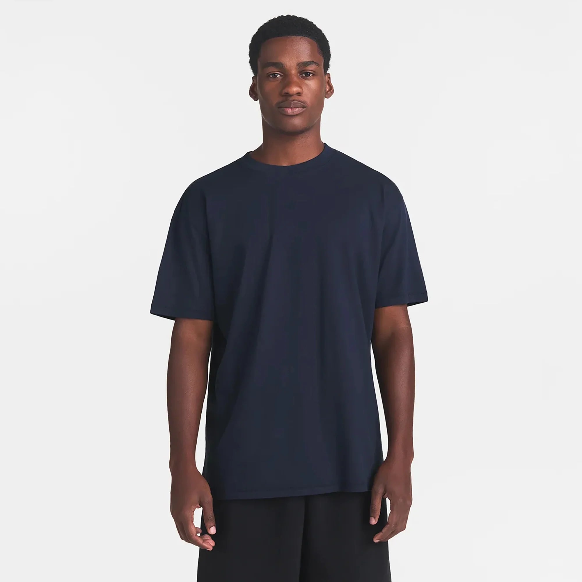 HEAVYWEIGHT COTTON MENS RELAXED T-SHIRT | BLUE BLACK ON A MODEL FRONT VIEW @ | FOCUS: 0.0, 1.0, 0.9