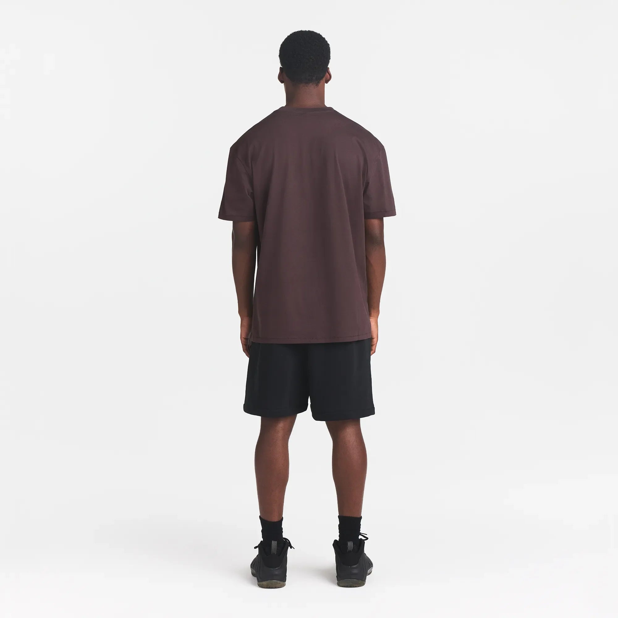 HEAVYWEIGHT COTTON MENS RELAXED T-SHIRT | RAISIN ON A MODEL BACK VIEW @ | FOCUS: 0.0, 1.0, 0.9