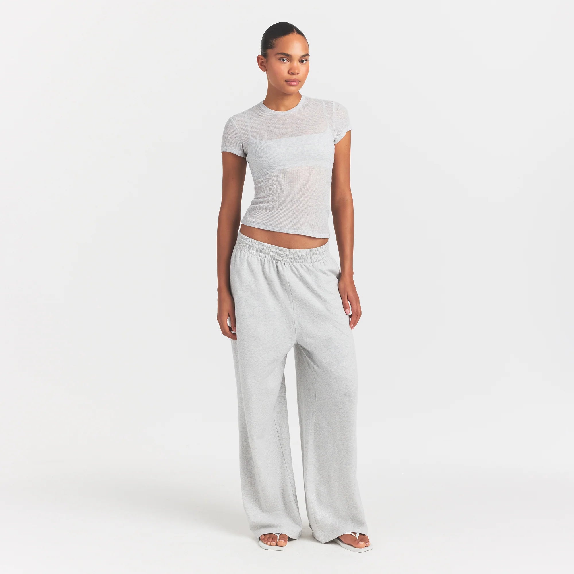SHEER RIB T-SHIRT | LIGHT HEATHER GREY ON A MODEL FRONT VIEW @ | FOCUS: 0.0, 1.0, 0.9