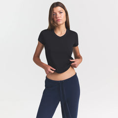 WORN IN JERSEY BABY V NECK TEE | WASHED ONYX ON A MODEL SIDE VIEW @ | FOCUS: 0.0, 1.0, 0.9