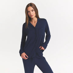 SKIMS SLEEP LONG SLEEVE BUTTON UP SET | NAVY ON A MODEL FRONT VIEW @ | FOCUS: 0.0, 1.0, 0.9