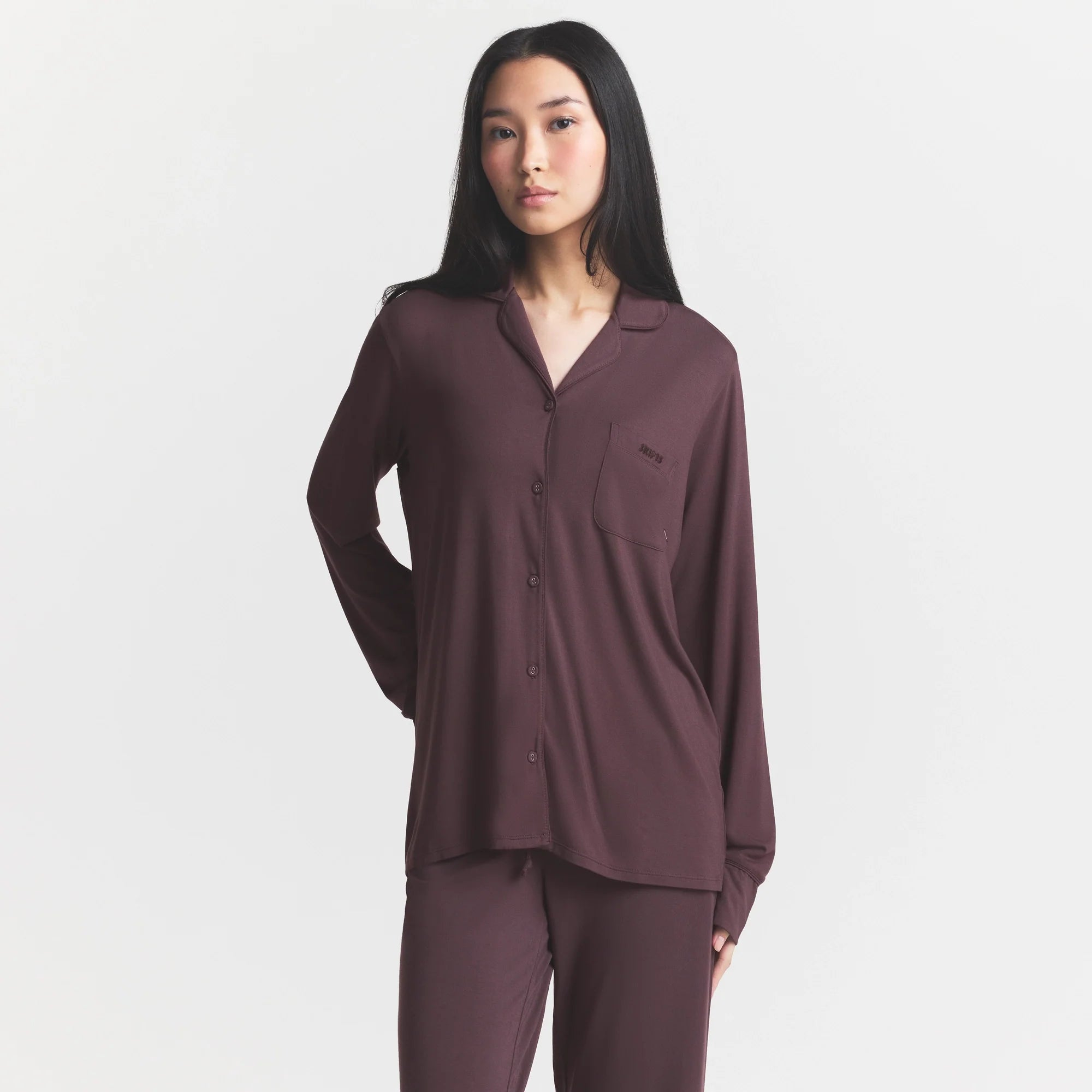 SKIMS SLEEP LONG SLEEVE BUTTON UP SET | RAISIN ON A MODEL SIDE VIEW @ | FOCUS: 0.0, 1.0, 0.9