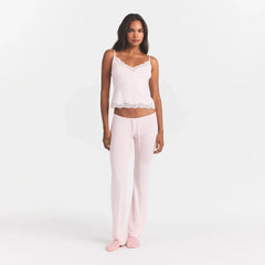 SKIMS SLEEP LACE CAMI AND PANT SET | BARELY PINK ON A MODEL FRONT VIEW @ | FOCUS: 0.0, 1.0, 0.9