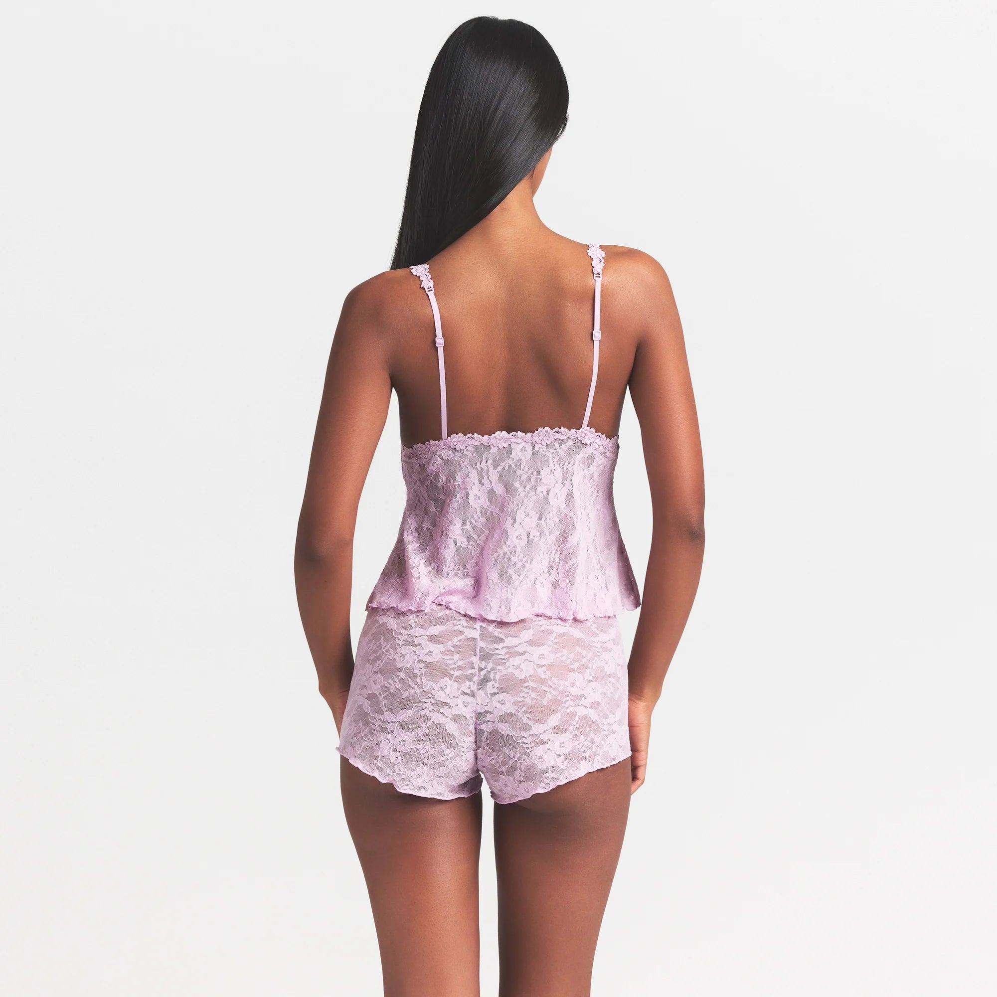 STRETCH LACE TRIANGLE CAMI AND SHORT SET | BABY PINK ON A MODEL SIDE VIEW @ | FOCUS: 0.0, 1.0, 0.9
