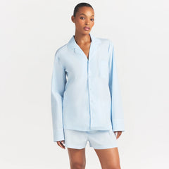 COTTON POPLIN SLEEP LONG SLEEVE AND BOXER SET | BABY BLUE CONTRAST ON A MODEL SIDE VIEW @ | FOCUS: 0.0, 1.0, 0.9