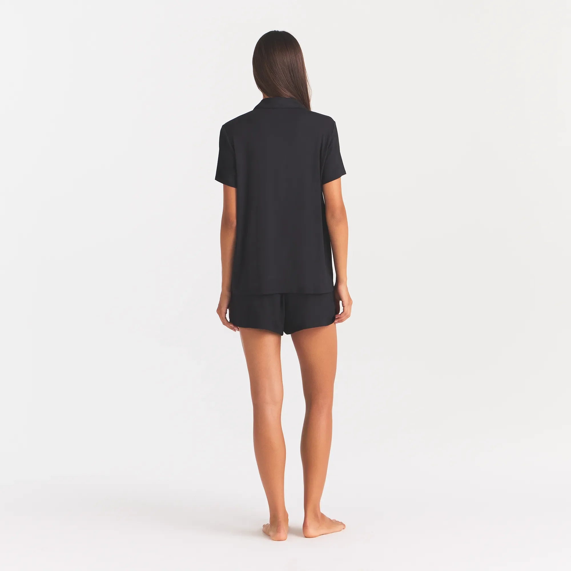 SKIMS SLEEP SHORT SLEEVE BUTTON UP SET | ONYX ON A MODEL BACK VIEW