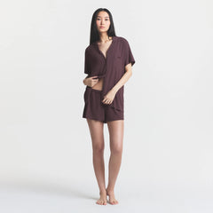 SKIMS SLEEP SHORT SLEEVE BUTTON UP SET | RAISIN ON A MODEL FRONT VIEW @ | FOCUS: 0.0, 1.0, 0.9