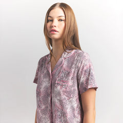 SKIMS SLEEP SHORT SLEEVE BUTTON UP SET | BLOOM MINI MULTI ANIMAL ON A MODEL SIDE VIEW @ | FOCUS: 0.0, 1.0, 0.9