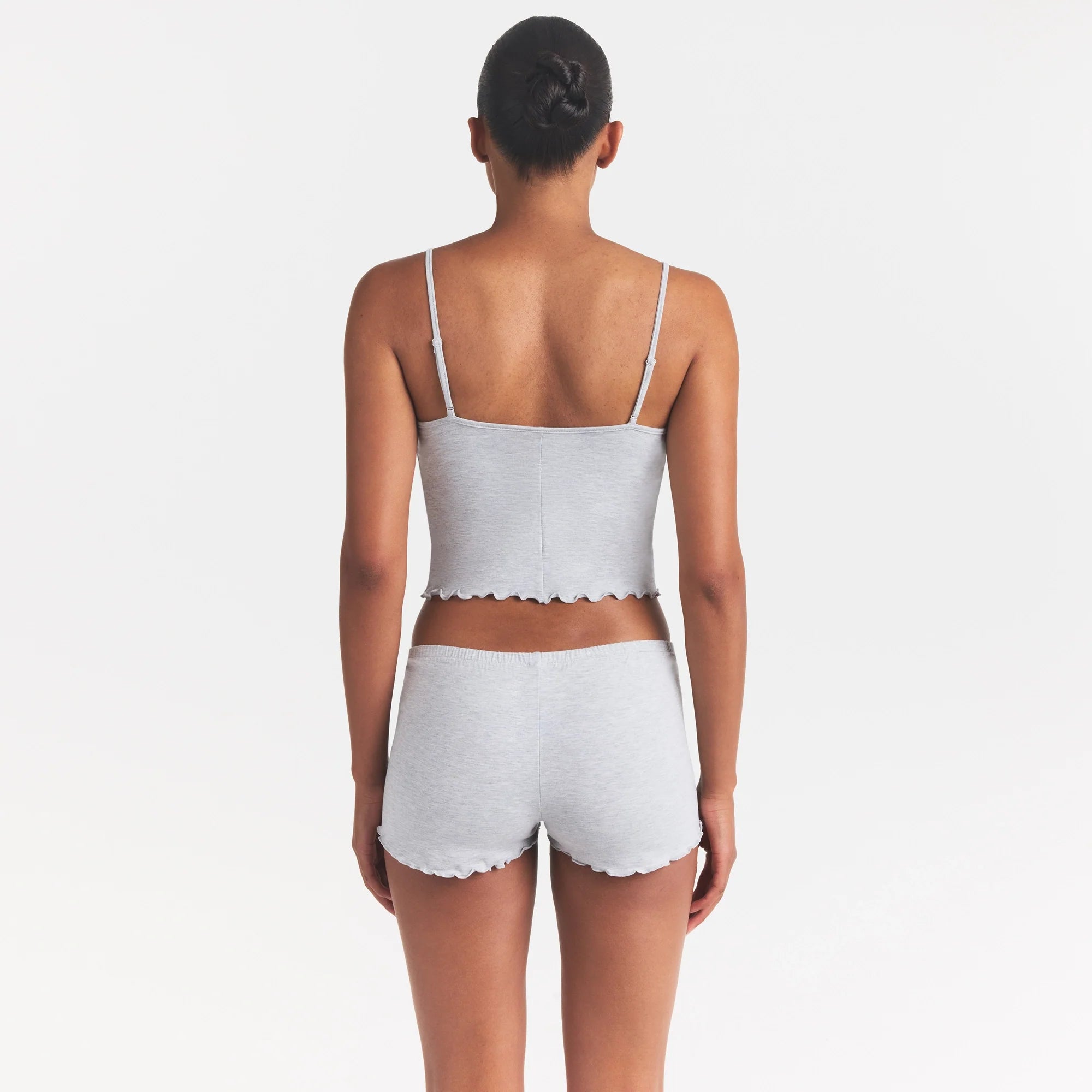 SKIMS SLEEP CAMI SET | LIGHT HEATHER GREY ON A MODEL SIDE VIEW @ | FOCUS: 0.0, 1.0, 0.9
