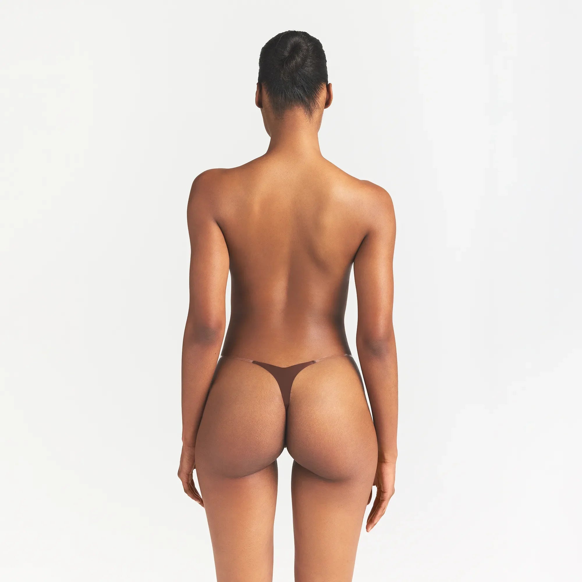 SKIMS STICKY BRA | COCOA ON A MODEL BACK VIEW @ | FOCUS: 0.0, 1.0, 0.9