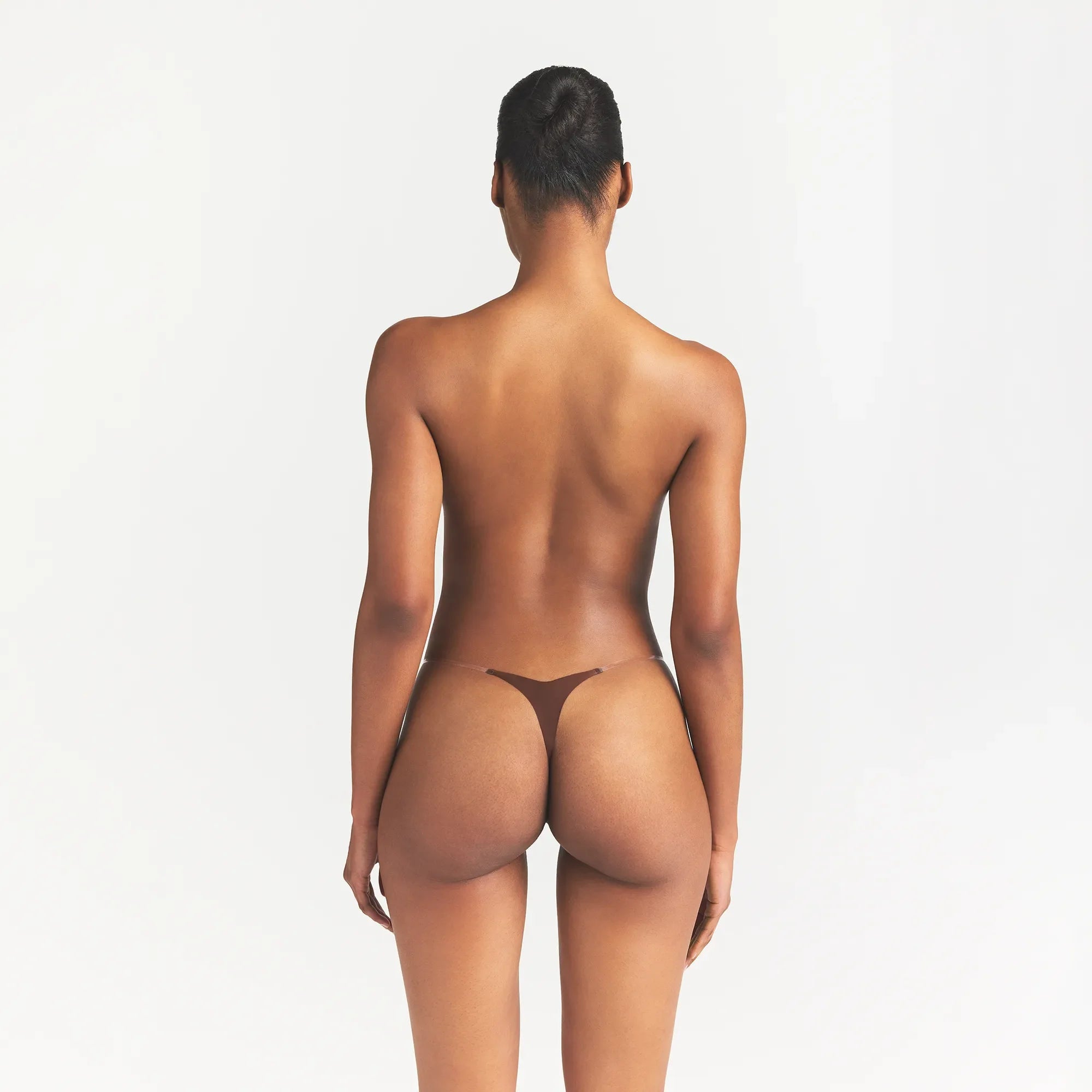 INVISIBLE CLEAR STRAP STRING THONG | COCOA ON A MODEL BACK VIEW @ | FOCUS: 0.0, 1.0, 0.9