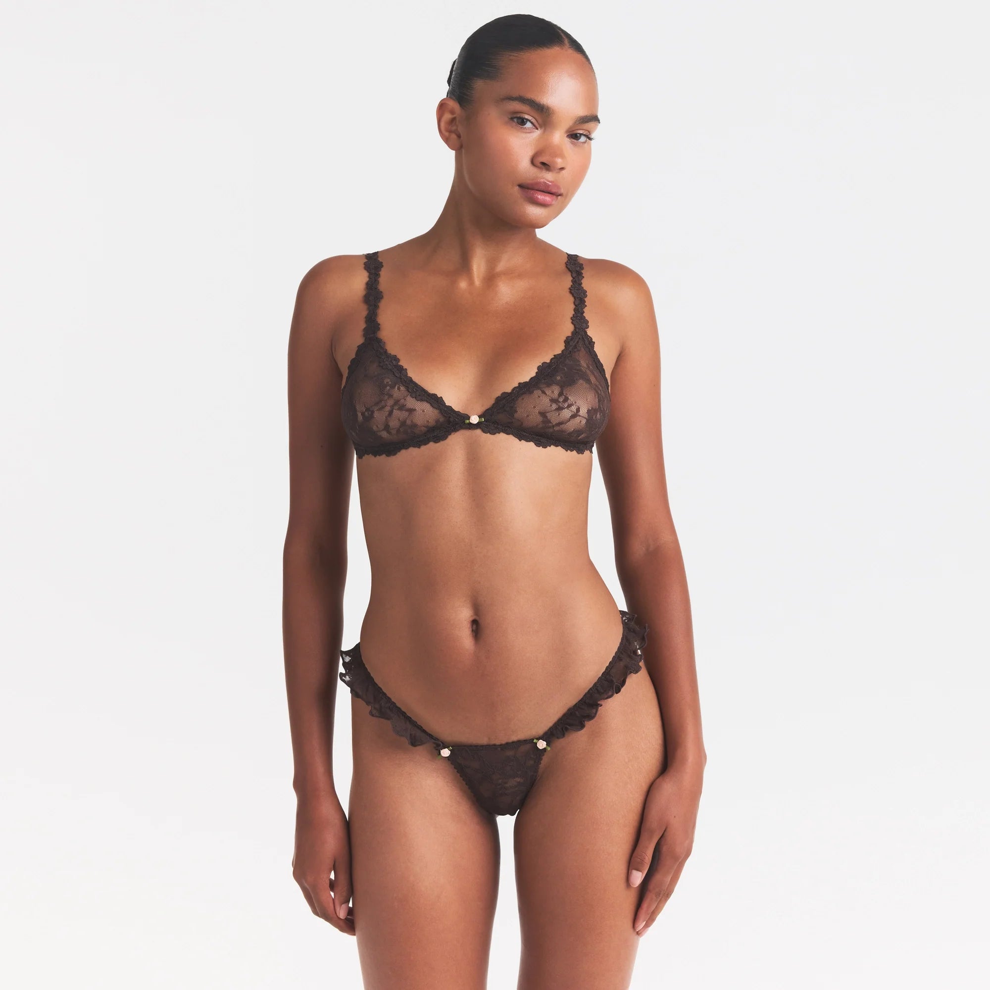 STRETCH LACE BUTTERFLY THONG | ESPRESSO ON A MODEL SIDE VIEW @ | FOCUS: 0.0, 1.0, 0.9