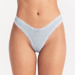 LIGHTWEIGHT COTTON LACE THONG | AIRSPACE ON A MODEL SIDE VIEW @ | FOCUS: 0.0, 1.0, 0.9