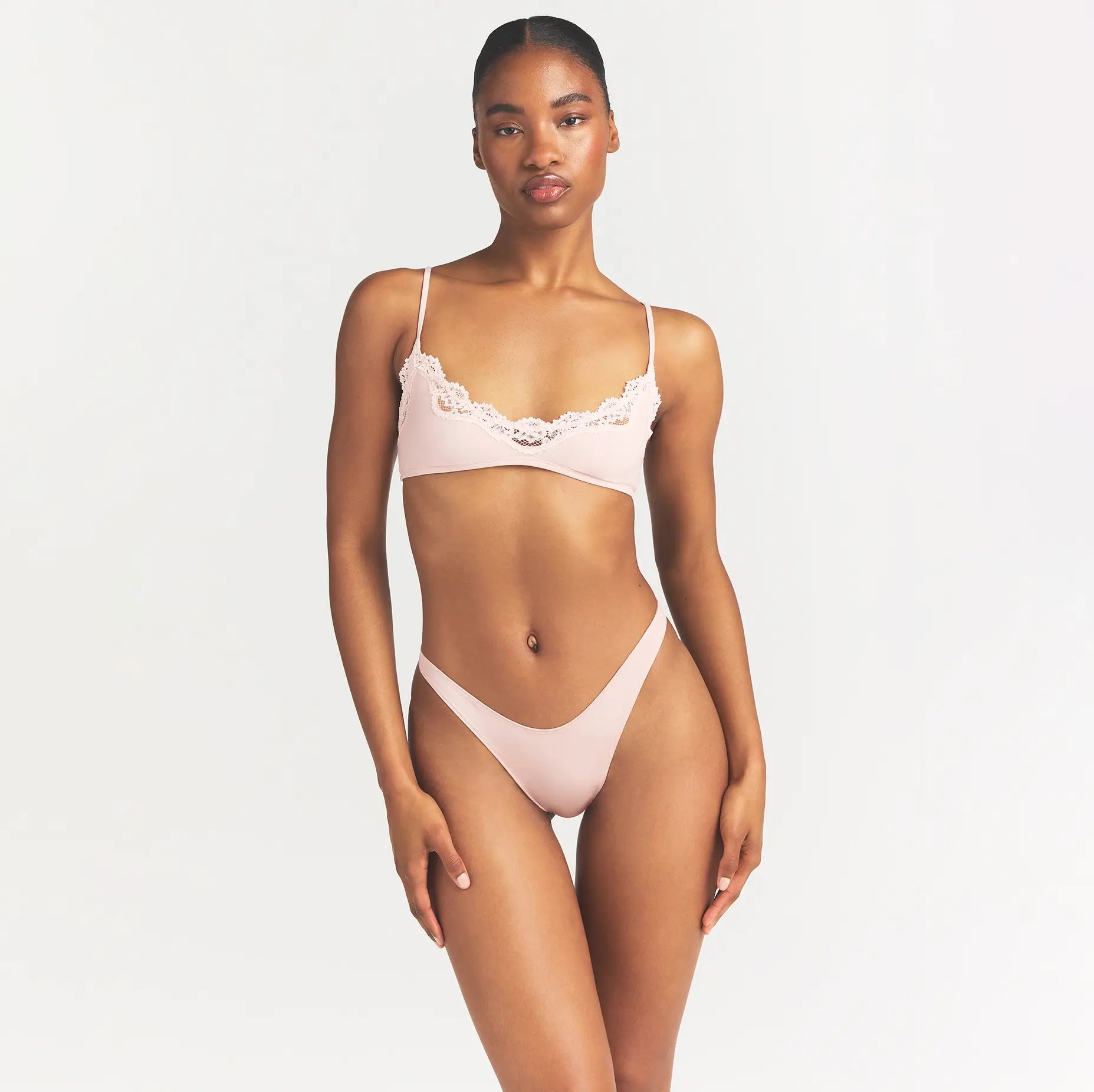 SHINE FOUNDATIONS DIPPED THONG | DUSTY PINK ON A MODEL FRONT VIEW @ | FOCUS: 0.0, 1.0, 0.9
