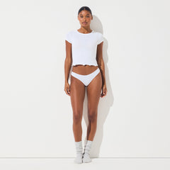 LIGHTWEIGHT COTTON THONG | SNOW ON A MODEL FRONT VIEW @ | FOCUS: 0.0, 1.0, 0.9