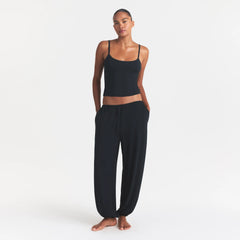 SKIMS SLEEP CAMI | ONYX ON A MODEL FRONT VIEW @ | FOCUS: 0.0, 1.0, 0.9