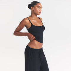 SKIMS SLEEP CAMI | ONYX ON A MODEL SIDE VIEW @ | FOCUS: 0.0, 1.0, 0.9