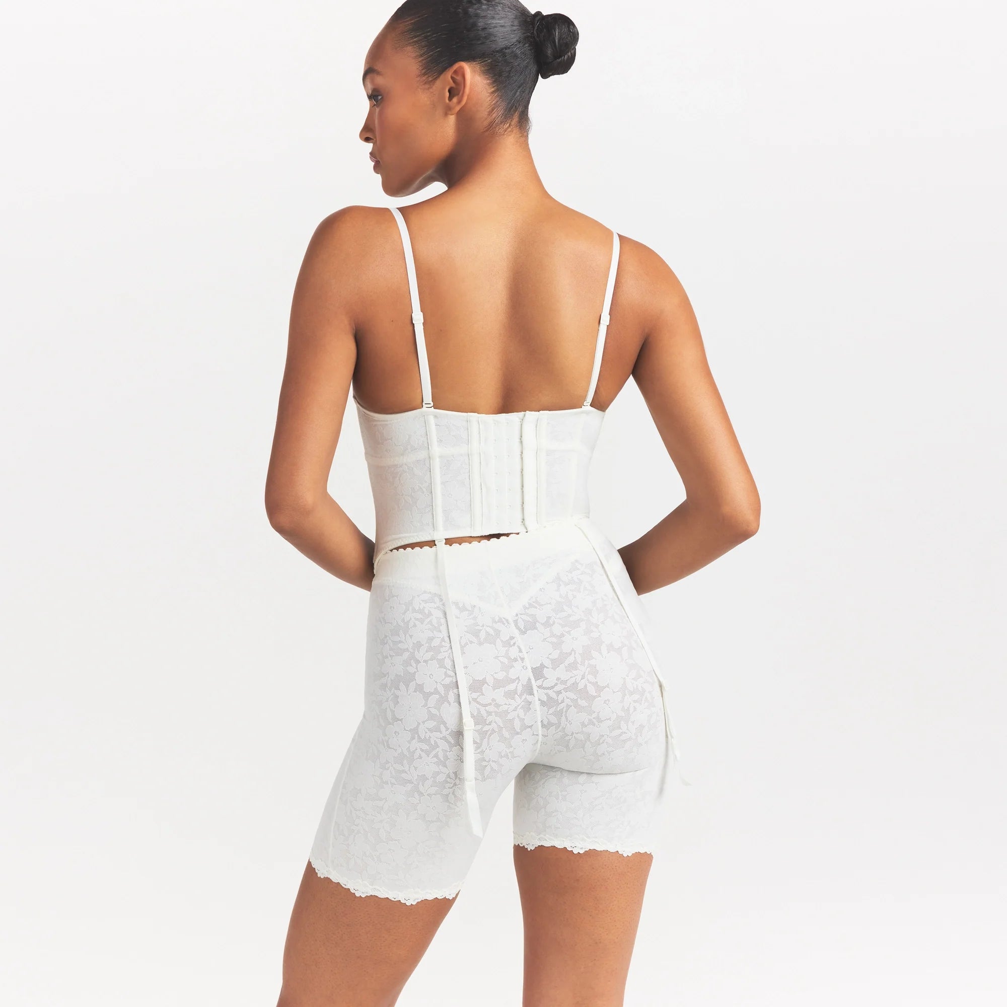 LACE SHAPEWEAR CORSET | IVORY ON A MODEL SIDE VIEW @