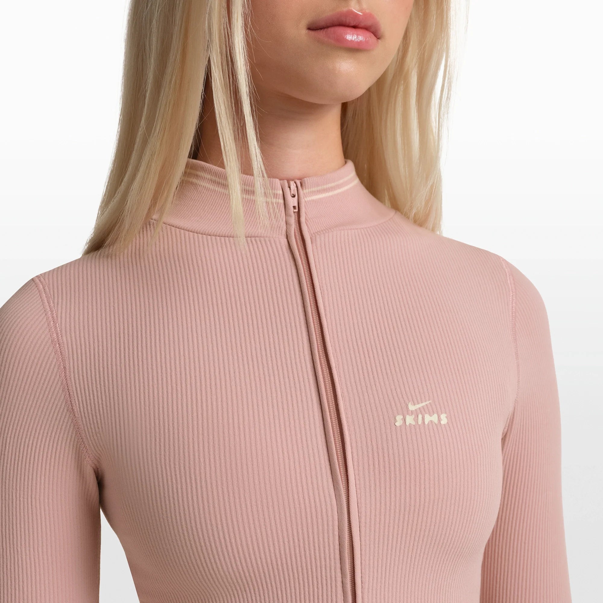 NikeSKIMS RIBBED SEAMLESS ZIP UP CROP JACKET | HIMALAYAN/ECRU ON A MODEL FRONT VIEW @ | FOCUS: 0.0, 1.0, 0.9